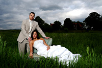 Bride and groom portrait in tall grass
