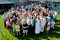 Big Group photo at a farm wedding in Michigan with bride and groom